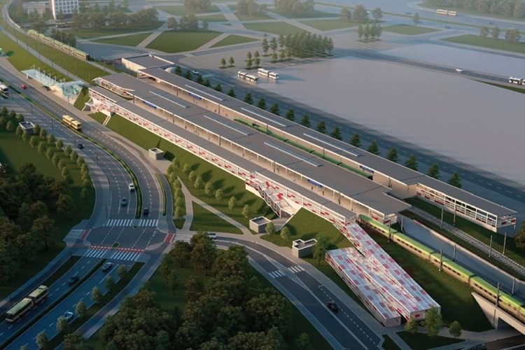 Wizualizacja przebudowanego przystanku Warszawa Stadion — widok z góry na nowe perony, zadaszenie i infrastrukturę komunikacyjną w otoczeniu zieleni